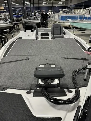 Slide: The Image of 2025 Ikon Boats VLX21 interior with advanced navigation system, displayed in a showroom. - 6