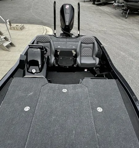 Slide: The Image of 2025 Ikon Boats VLX21 interior with gray seating and spacious deck. - 11