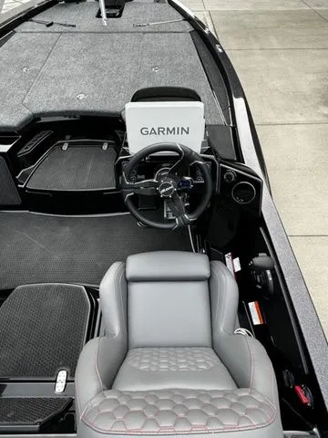 Slide: The Image of 2025 Ikon Boats VLX21 interior with Garmin navigation system and sleek seating. - 5