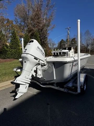 Slide: The Image of 2025 Bulls Bay 2000 boat with Suzuki outboard motor on a trailer. - 3