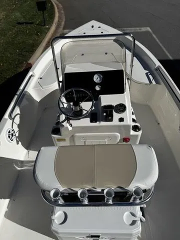 Slide: The Image of 2025 Bulls Bay 2000 boat interior with steering console and seating, showcasing modern design. - 4
