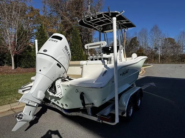 Slide: The Image of 2025 Bulls Bay 200CC boat on trailer with Suzuki 150 outboard motor. - 3