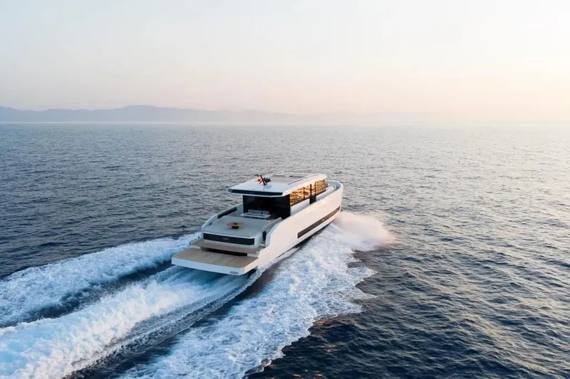 Slide: The Image of Luxury De Antonio Yachts D60 cruising on open sea, 2026 model. - 11