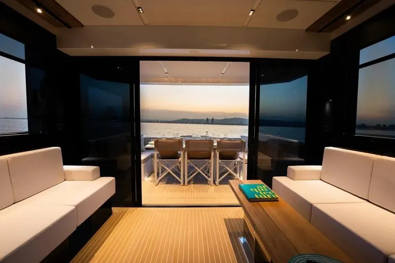 Slide: The Image of Luxurious interior of 2026 De Antonio Yachts D60 with ocean view at sunset. - 12