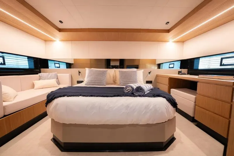 Slide: The Image of Luxurious interior of 2026 De Antonio Yachts D60, featuring elegant bedroom design and modern furnishings. - 25