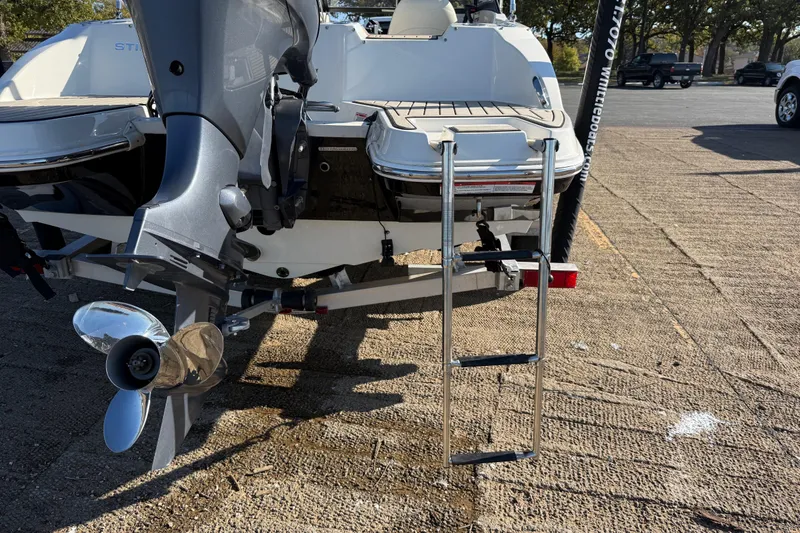 Slide: The Image of 2023 Stingray 192 DC trailer tire on textured surface, close-up view. - 62