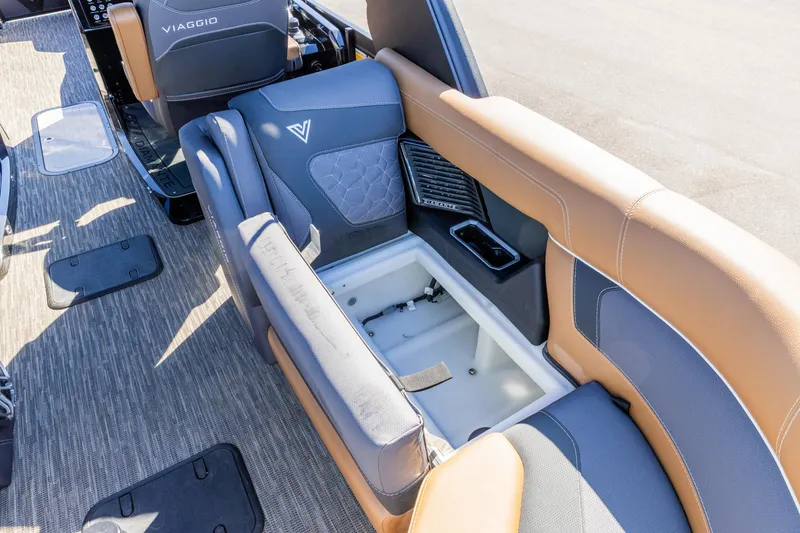 Slide: The Image of 2026 Viaggio Diamante UWA boat interior with storage compartment and luxurious seating. - 10