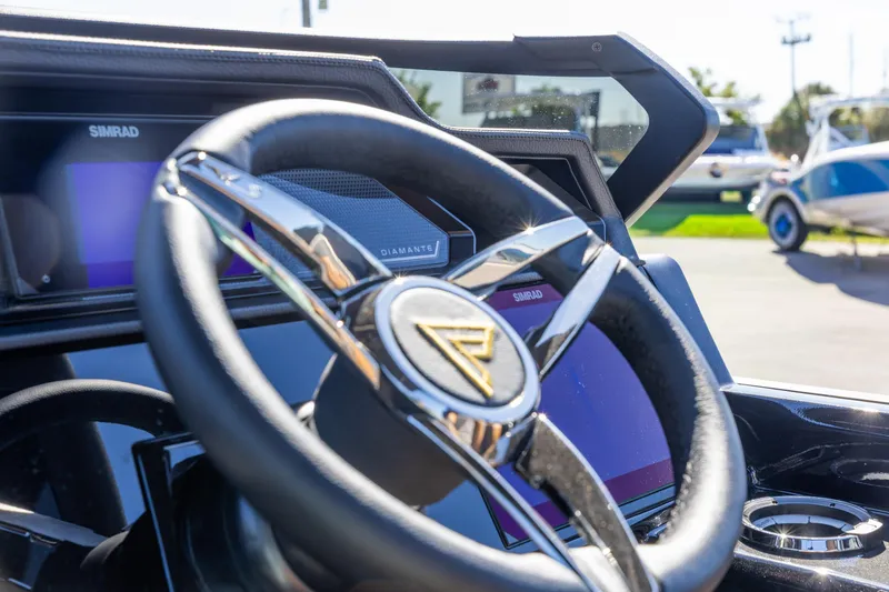 Slide: The Image of Steering wheel of 2026 Viaggio Diamante UWA boat with Simrad display. - 26