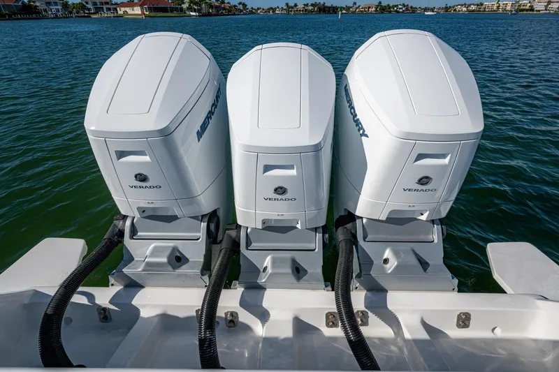 Slide: The Image of Triple Mercury Verado outboard engines on 2024 Intrepid 477 Evolution boat. - 52