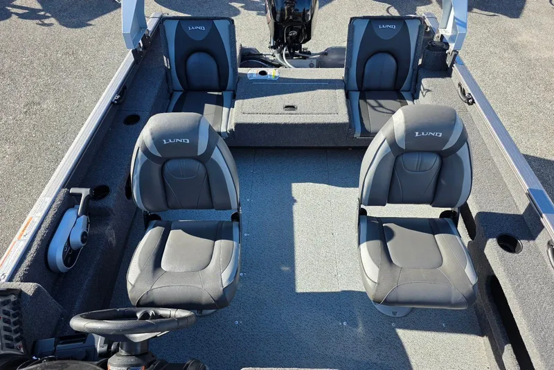Slide: The Image of 2022 Lund 1675 Adventure SS boat interior with four cushioned seats. - 14