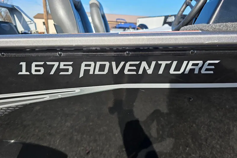 Slide: The Image of 2022 Lund 1675 Adventure SS boat, close-up of model name on side. - 4