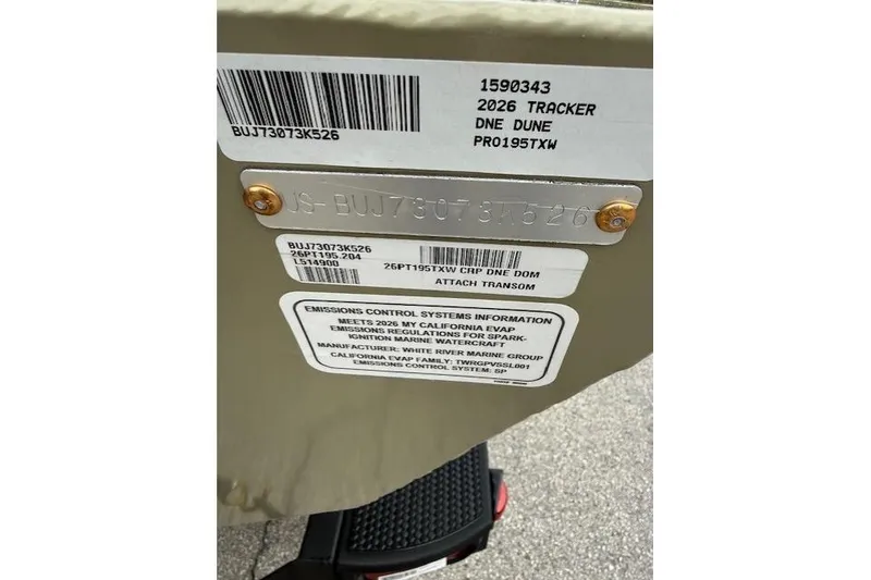 Slide: The Image of 2026 Tracker Pro Team 195 boat identification and emissions control labels. - 10