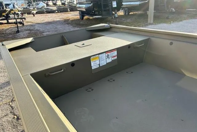 Slide: The Image of 2026 Tracker Grizzly 1648 Utility boat interior, showcasing spacious and durable design. - 5