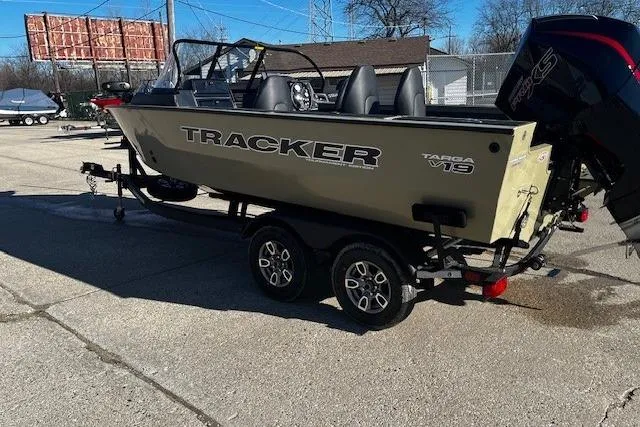Slide: The Image of 2026 Tracker Targa V-19 Combo boat on trailer in outdoor setting. - 3