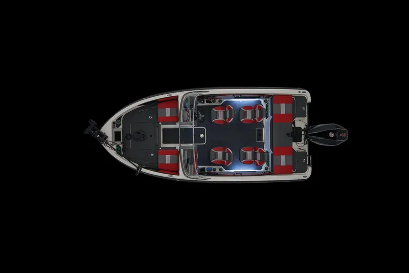 Slide: The Image of 2026 Ranger 1850MS boat towing a person on a tube across a serene lake at sunset. - 12