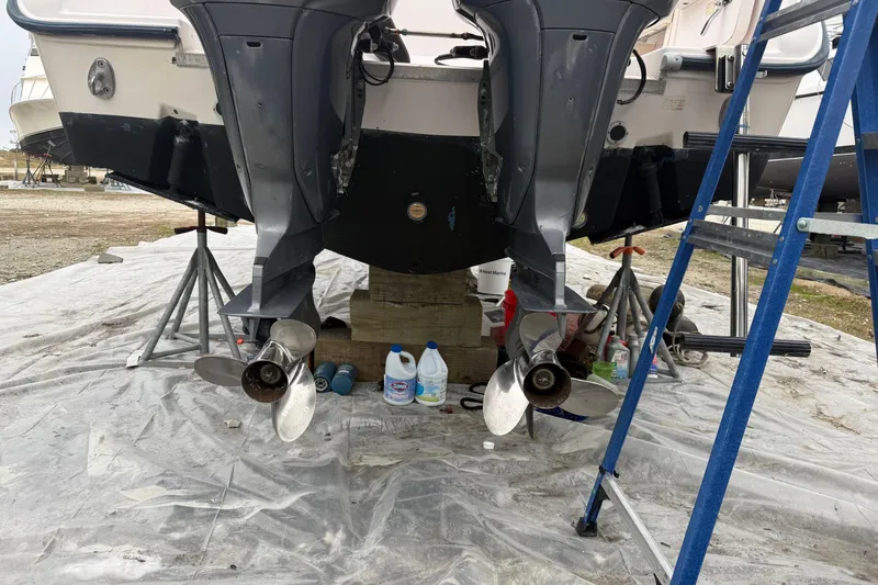 Slide: The Image of 2002 Grady-White Sailfish 282 boat interior with seating and speaker, docked at marina. - 21