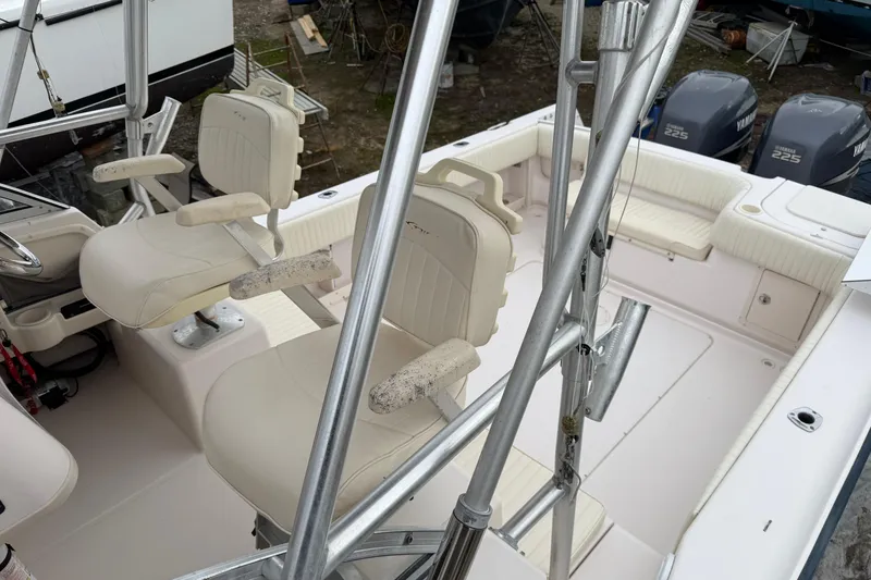 Slide: The Image of 2002 Grady-White Sailfish 282 boat on stands, undergoing maintenance outdoors. - 26