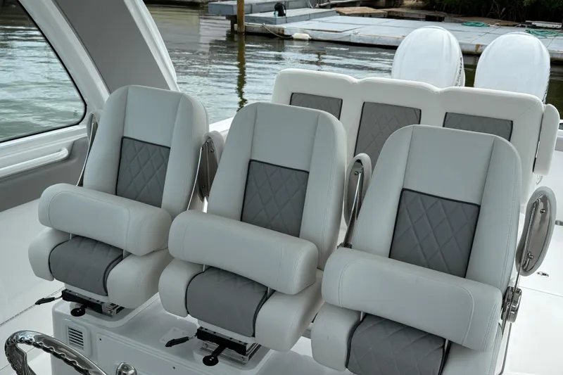 Slide: The Image of Luxury seating on 2026 Everglades 367 CX boat, featuring plush, ergonomic design. - 20