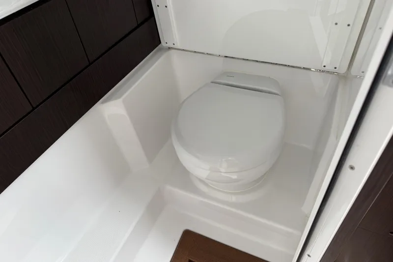 Slide: The Image of Modern bathroom in 2026 Everglades 367 CX boat, featuring sleek toilet design. - 45