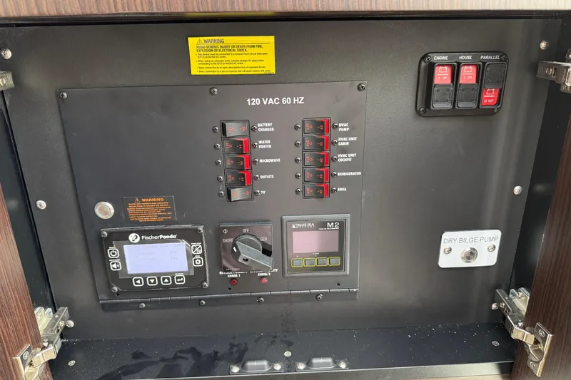 Slide: The Image of Electrical control panel of 2026 Everglades 367 CX boat with switches and indicators. - 48