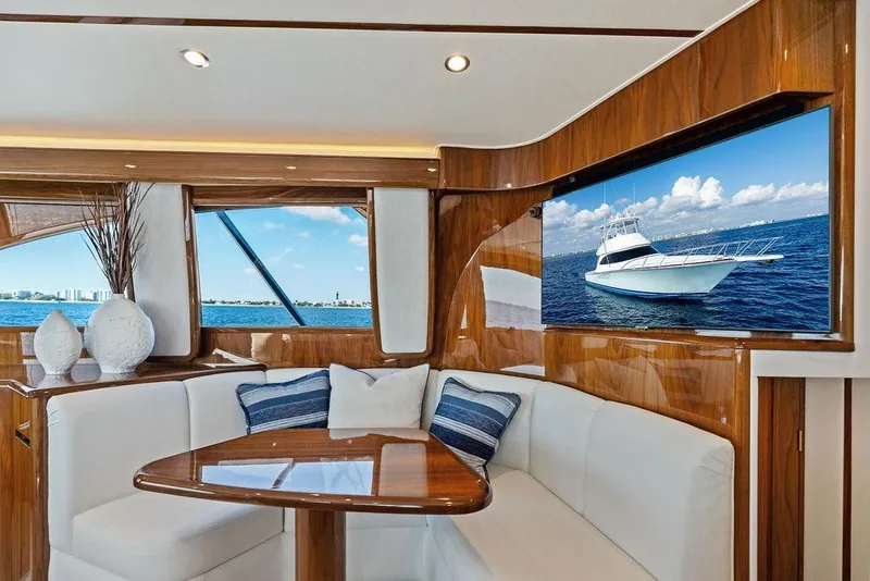 Slide: The Image of Luxurious interior of 2022 Viking 48 Convertible yacht with elegant seating and ocean view. - 44