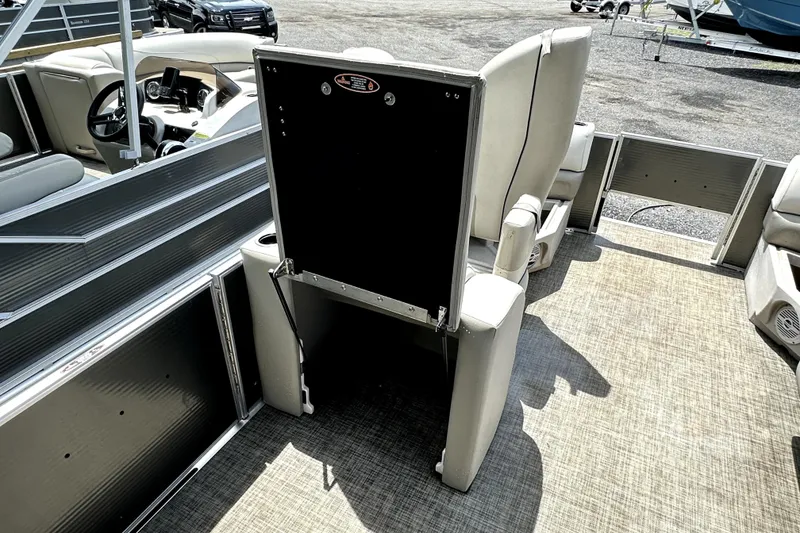 Slide: The Image of 2022 Cypress Cay Seabreeze 232 pontoon boat interior with seating and helm. - 13