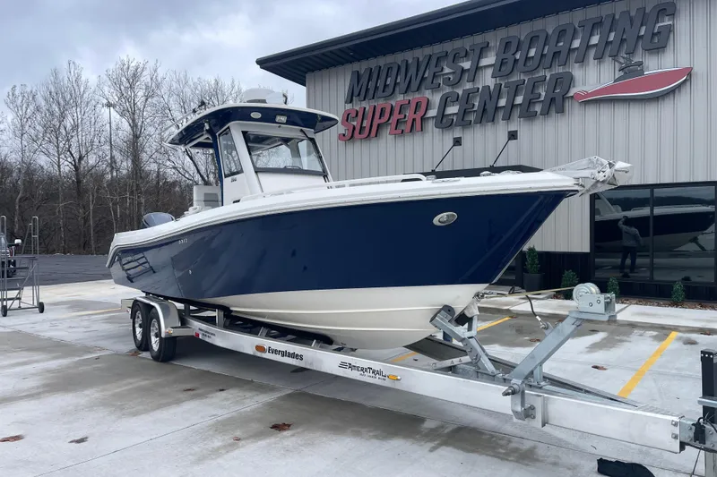 Slide: The Image of 2012 Everglades 295 Center Console boat on trailer at Midwest Boating Super Center. - 2