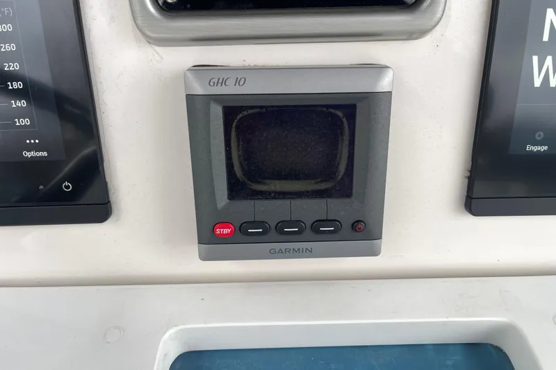 Slide: The Image of Garmin GHC 10 marine display on 2012 Everglades 295 Center Console dashboard. - 24