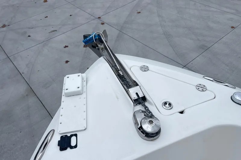 Slide: The Image of Bow of 2012 Everglades 295 Center Console with anchor and chain mechanism. - 28