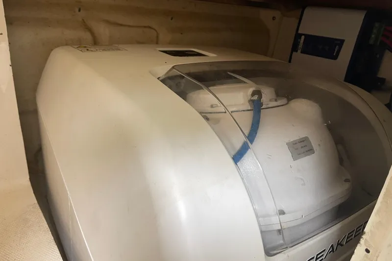 Slide: The Image of Seakeeper stabilizer inside 2012 Everglades 295 Center Console boat compartment. - 35