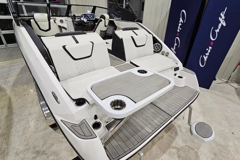 Slide: The Image of 2024 Yamaha Boats 222SE interior with sleek seating and modern dashboard design. - 7