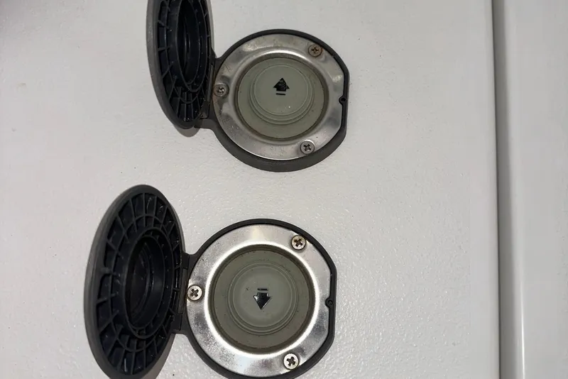 Slide: The Image of Fuel caps on a 2022 Sea Hunt Gamefish 30 Coffin Box boat. - 12