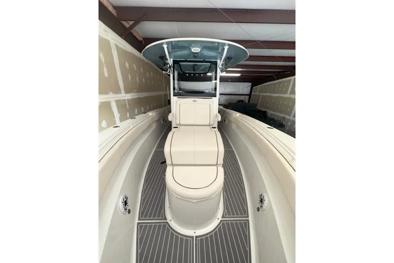 Slide: The Image of 2022 Sea Hunt Gamefish 30 Coffin Box boat interior, featuring sleek design and spacious seating. - 17