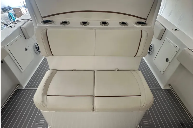 Slide: The Image of 2022 Sea Hunt Gamefish 30 Coffin Box interior seating with cup holders and storage. - 27