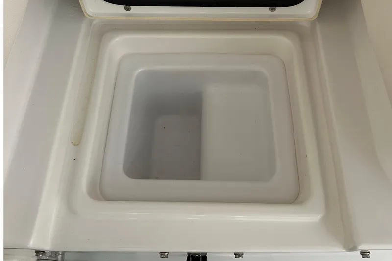 Slide: The Image of 2022 Sea Hunt Gamefish 30 Coffin Box interior, white compartment detail. - 41