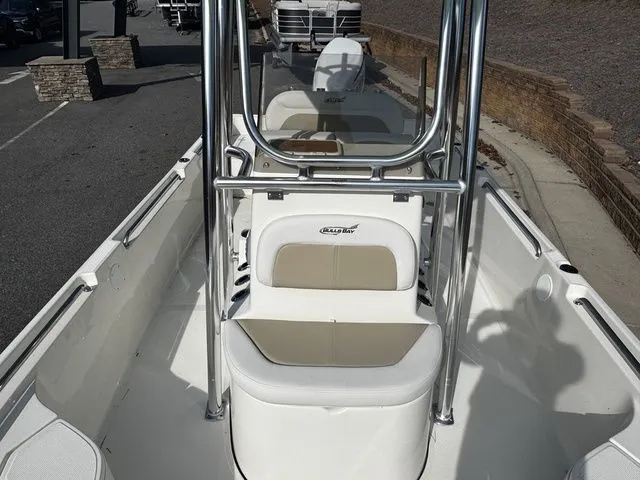 Slide: The Image of 2025 Bulls Bay 2400 boat interior with seating and stainless steel frame. - 9