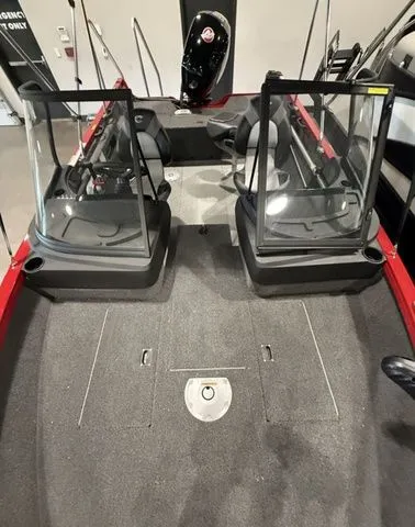 Slide: The Image of 2025 Crestliner 1750 Hawk interior with dual consoles and spacious deck. - 10