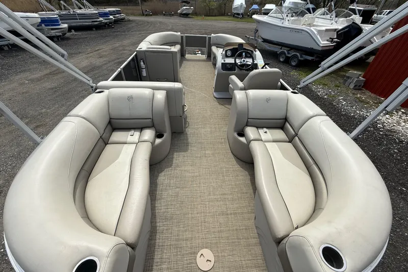 Slide: The Image of 2022 Cypress Cay Seabreeze 232 pontoon boat with spacious seating and modern design. - 6