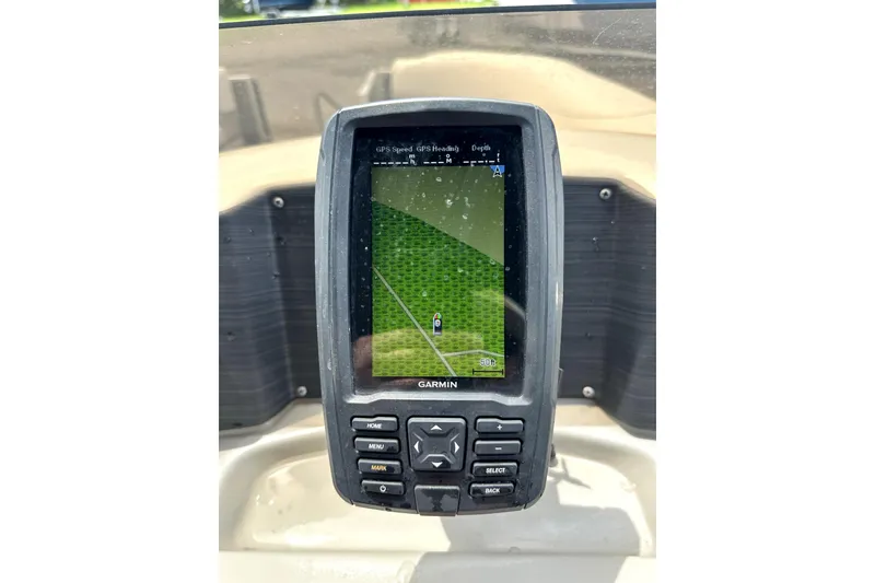 Slide: The Image of Garmin GPS device on 2022 Cypress Cay Seabreeze 232 boat dashboard. - 7