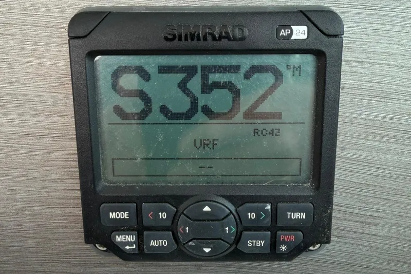 Slide: The Image of Simrad AP24 autopilot display on 2017 World Cat Glacier Bay Edition 2740 Dual Console. - 16