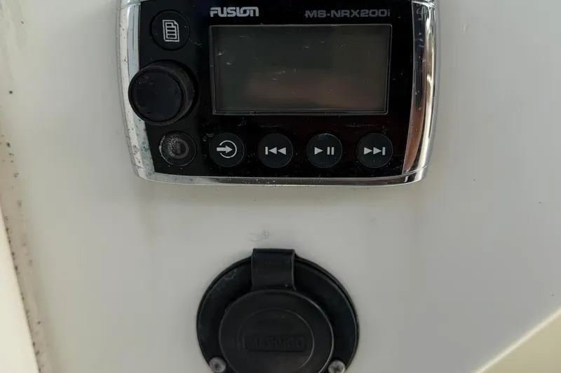 Slide: The Image of Fusion MS-NRX200i marine stereo on 2017 World Cat Glacier Bay Edition 2740 Dual Console. - 19
