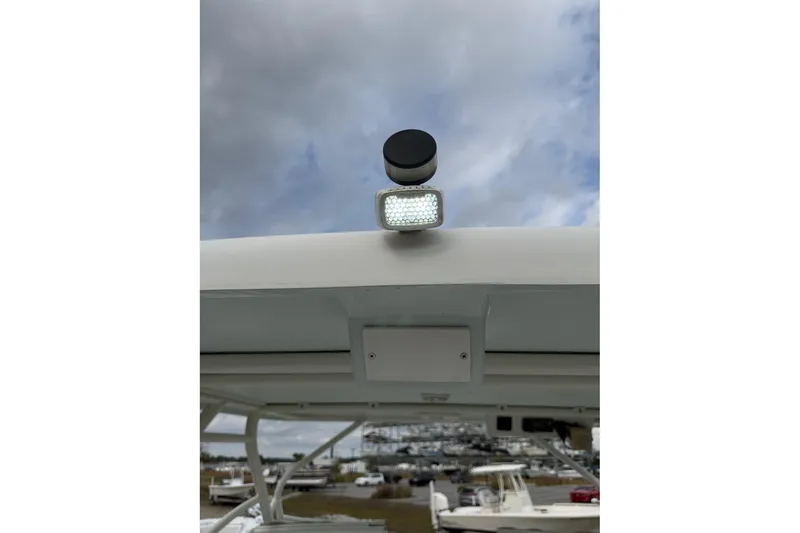 Slide: The Image of 2017 World Cat Glacier Bay Edition 2740 Dual Console boat with mounted light and radar. - 25