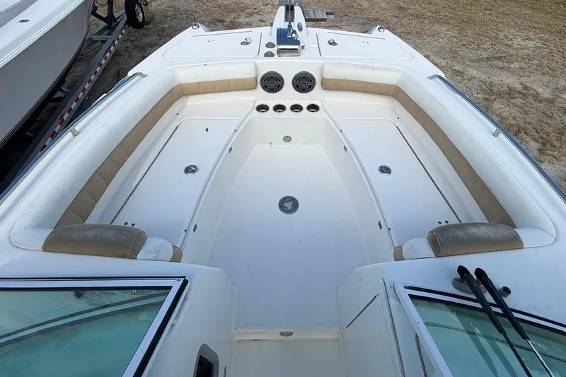 Slide: The Image of 2017 World Cat Glacier Bay Edition 2740 Dual Console boat interior with seating and storage. - 37