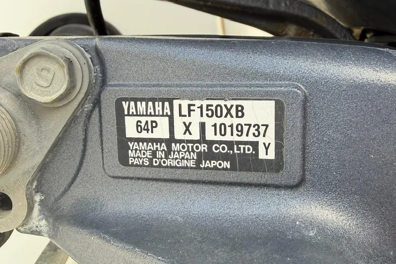 Slide: The Image of Yamaha LF150XB engine label on 2017 World Cat Glacier Bay Edition 2740 Dual Console. - 57