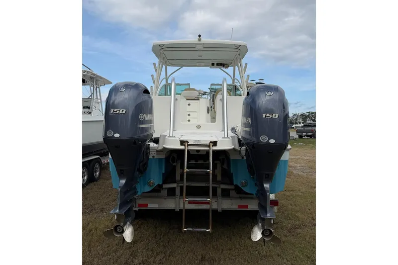 Slide: The Image of 2017 World Cat Glacier Bay Edition 2740 Dual Console with twin Yamaha 150 engines. - 6