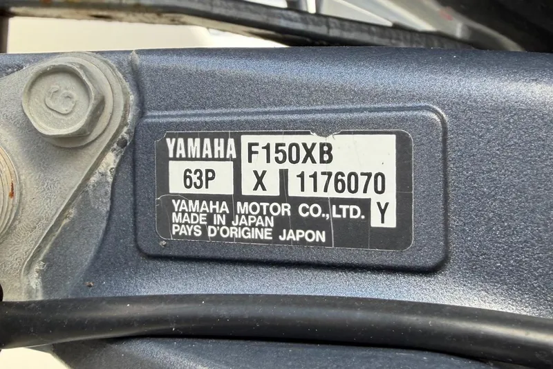Slide: The Image of Yamaha F150XB engine label on 2017 World Cat Glacier Bay Edition 2740 Dual Console. - 63