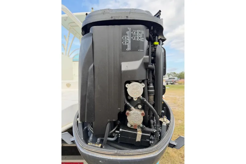 Slide: The Image of 2017 World Cat Glacier Bay Edition 2740 Dual Console boat engine close-up. - 65