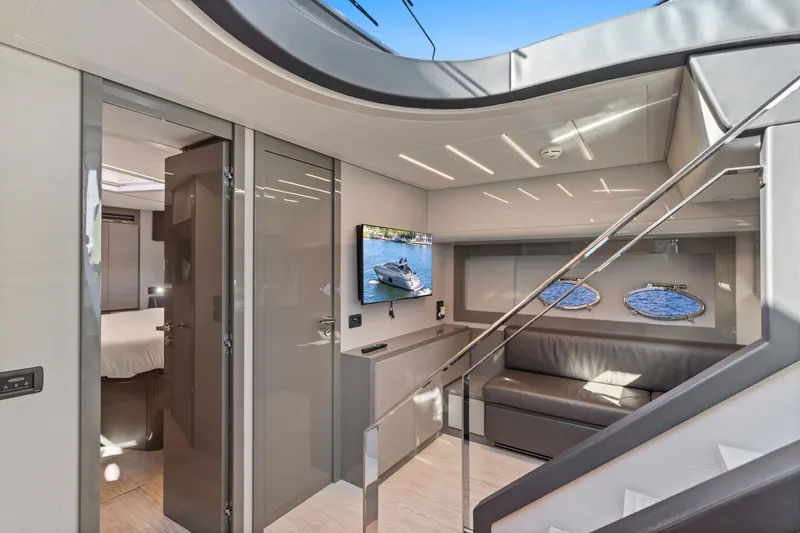 Slide: The Image of Luxurious interior of 2016 Pershing 62' yacht with modern design and comfortable seating. - 20