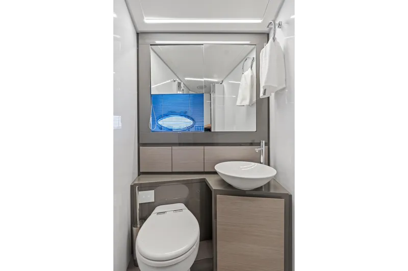 Slide: The Image of Modern bathroom in 2016 Pershing 62' yacht with sleek fixtures and elegant design. - 26