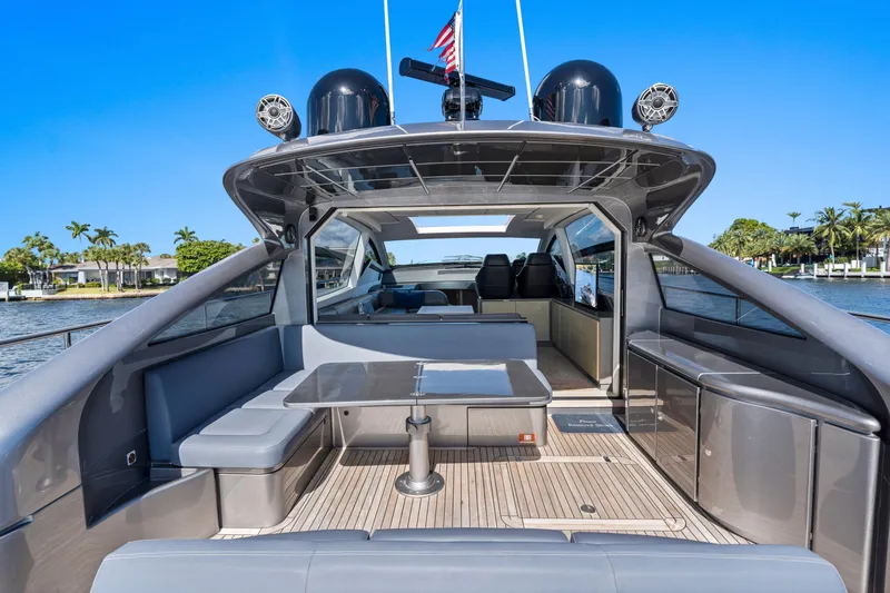 Slide: The Image of Luxurious 2016 Pershing 62' yacht with sleek design and spacious deck area. - 7